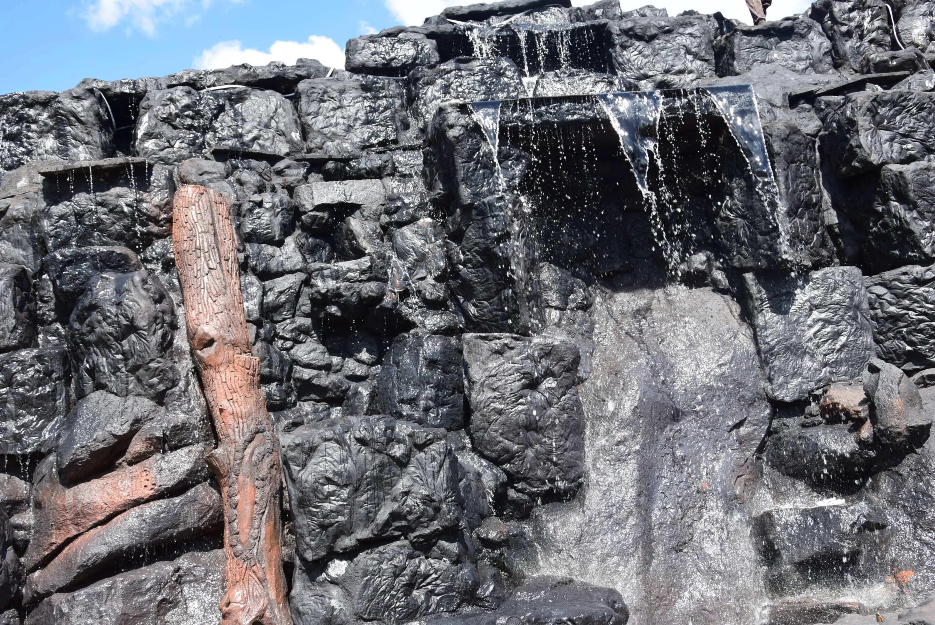Water running down the constructed rock waterfall.