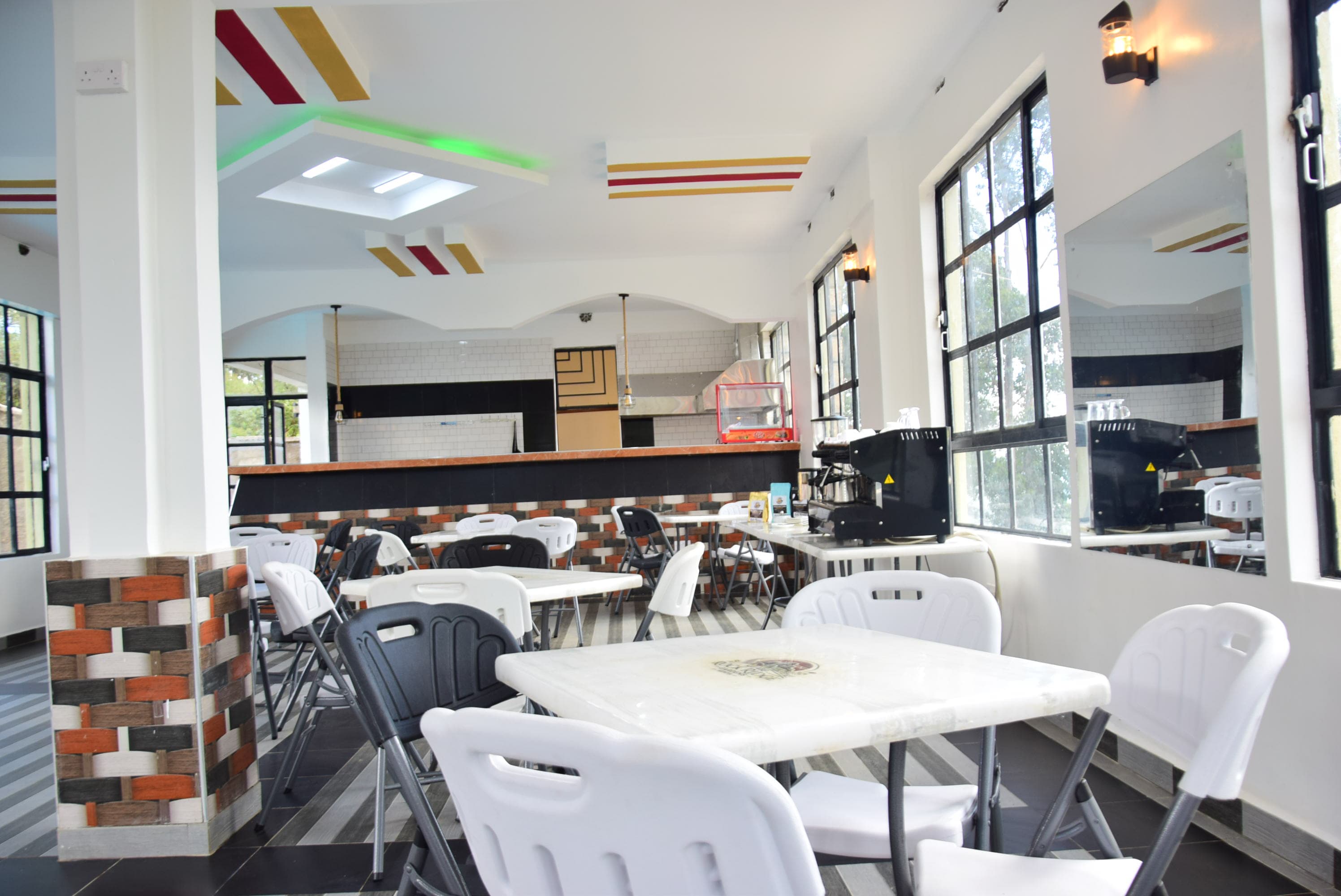 The dining room and service counter seen from the far end of the room.